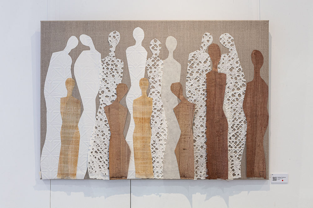 Collage on canvas of layered human silhouettes in earth tones